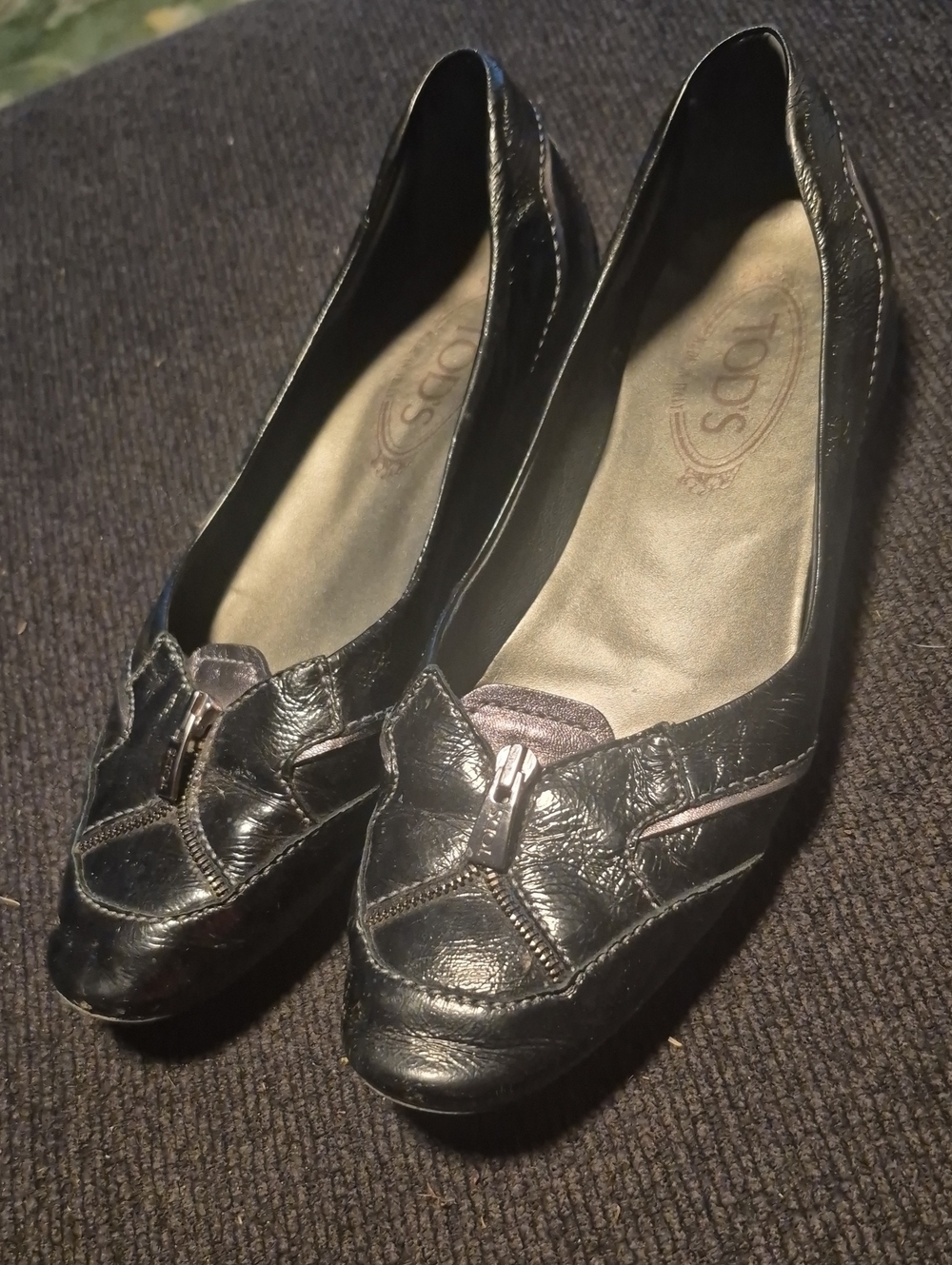 Tod's Black Leather Loafers with Silver Accent